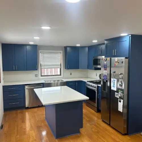 A complete kitchen overhaul featuring modern appliances and custom cabinetry.