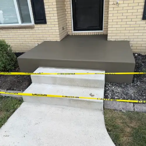 Constructed a new concrete porch and steps for a residential home, providing a durable and modern entry point.
